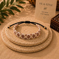 Bracelet tressé or , blanc et marron